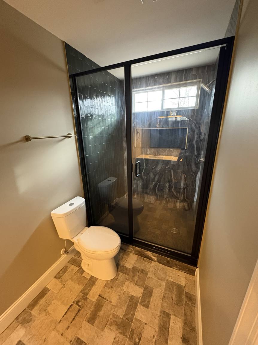 Black-framed glass shower